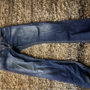 2 pair of True Religion Jeans. One is Bootcut and the other is Straight Fit.